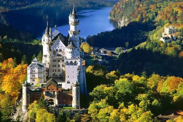 White castle among autumn trees