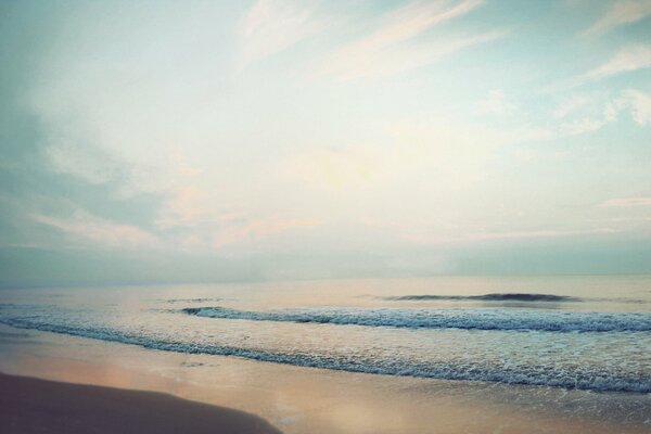 Sunset sky over the calm sea coast