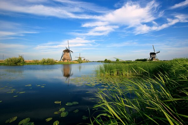 Old mills on the shore of the Dutch Canal