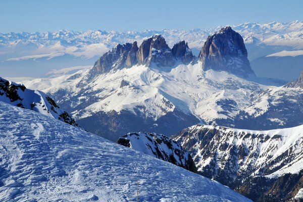 Panorama of snow-capped mountains in winter