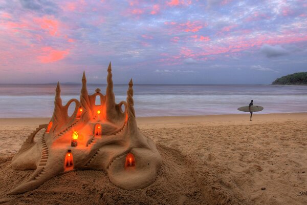 Sand castle on the seashore