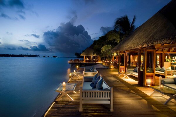 View of the evening sea from the coastal cafe