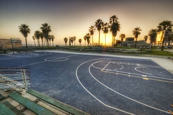 View of the basketball field at sunset