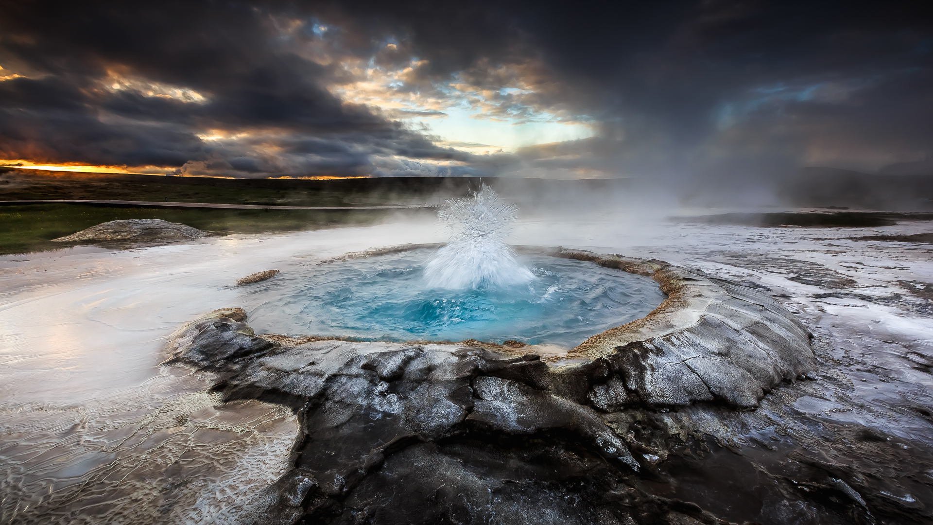 islandia lodowiec gejzer wulkan woda zachód słońca niebo natura