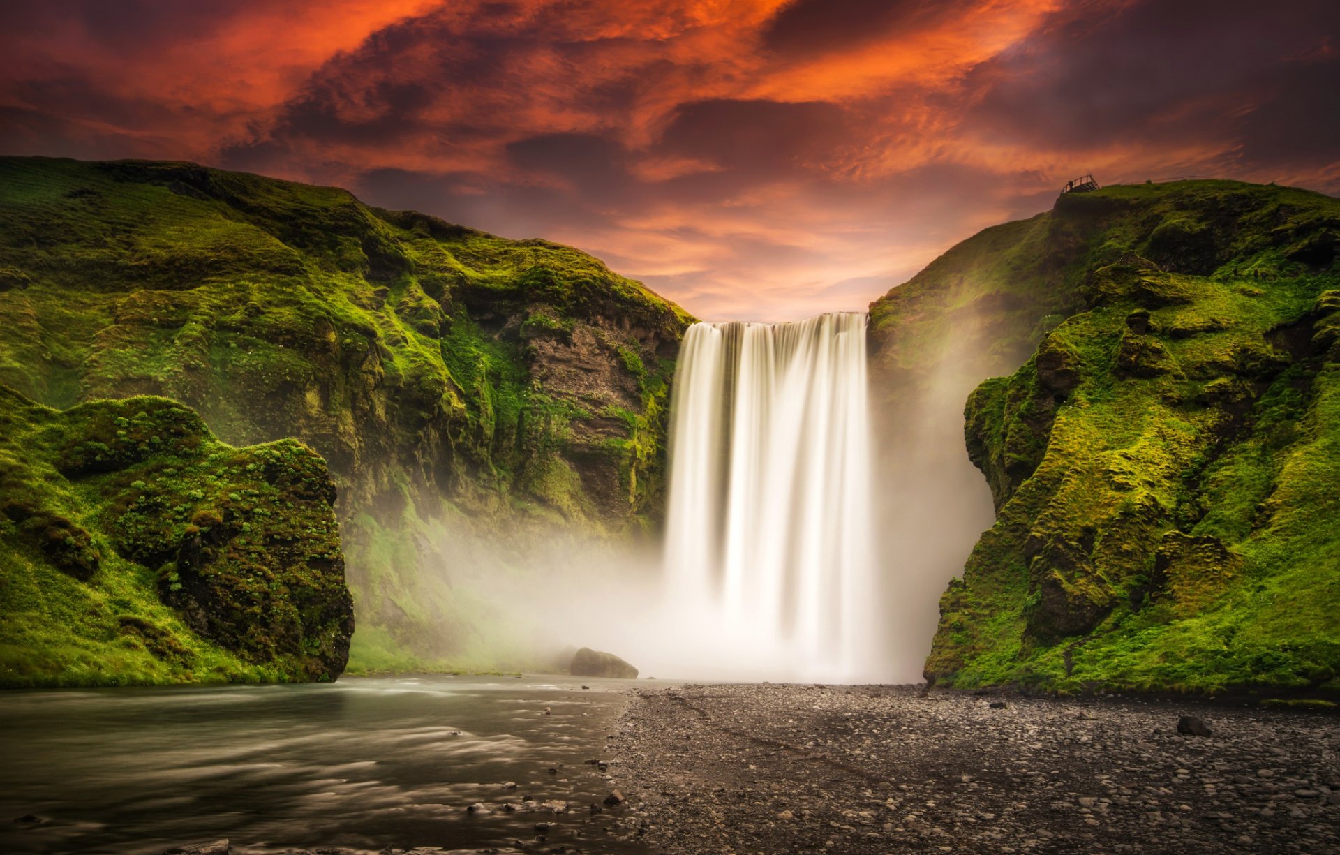 islanda skogafoss cascata skogafoss montagne fiume tramonto cielo natura