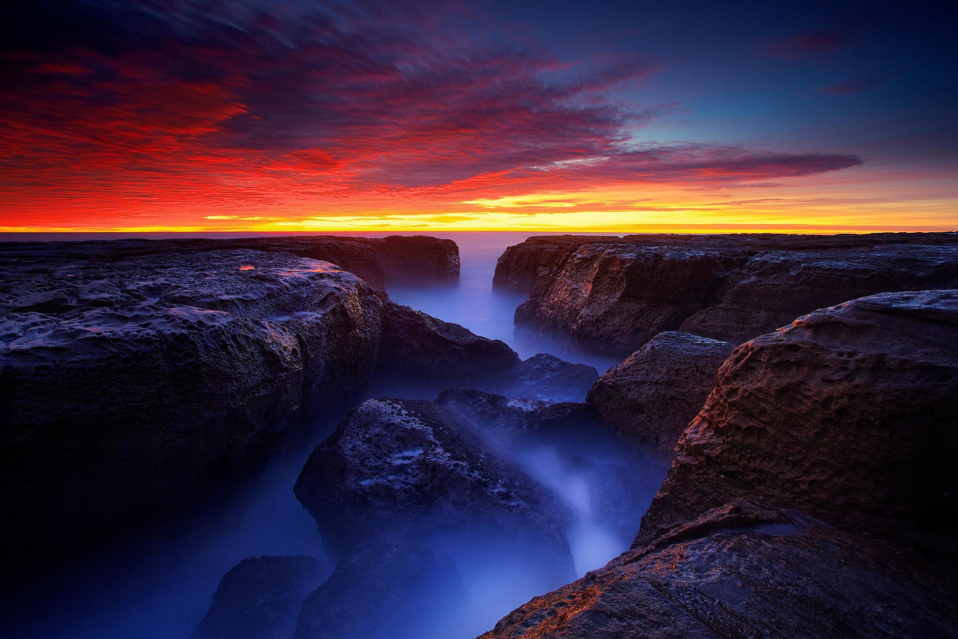 dawn beach rock ocean