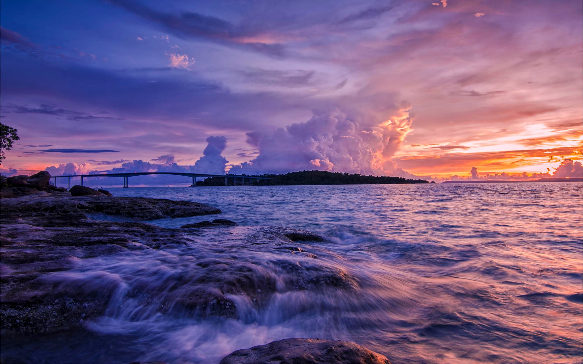 cielo nubes mar puente puesta de sol piedras