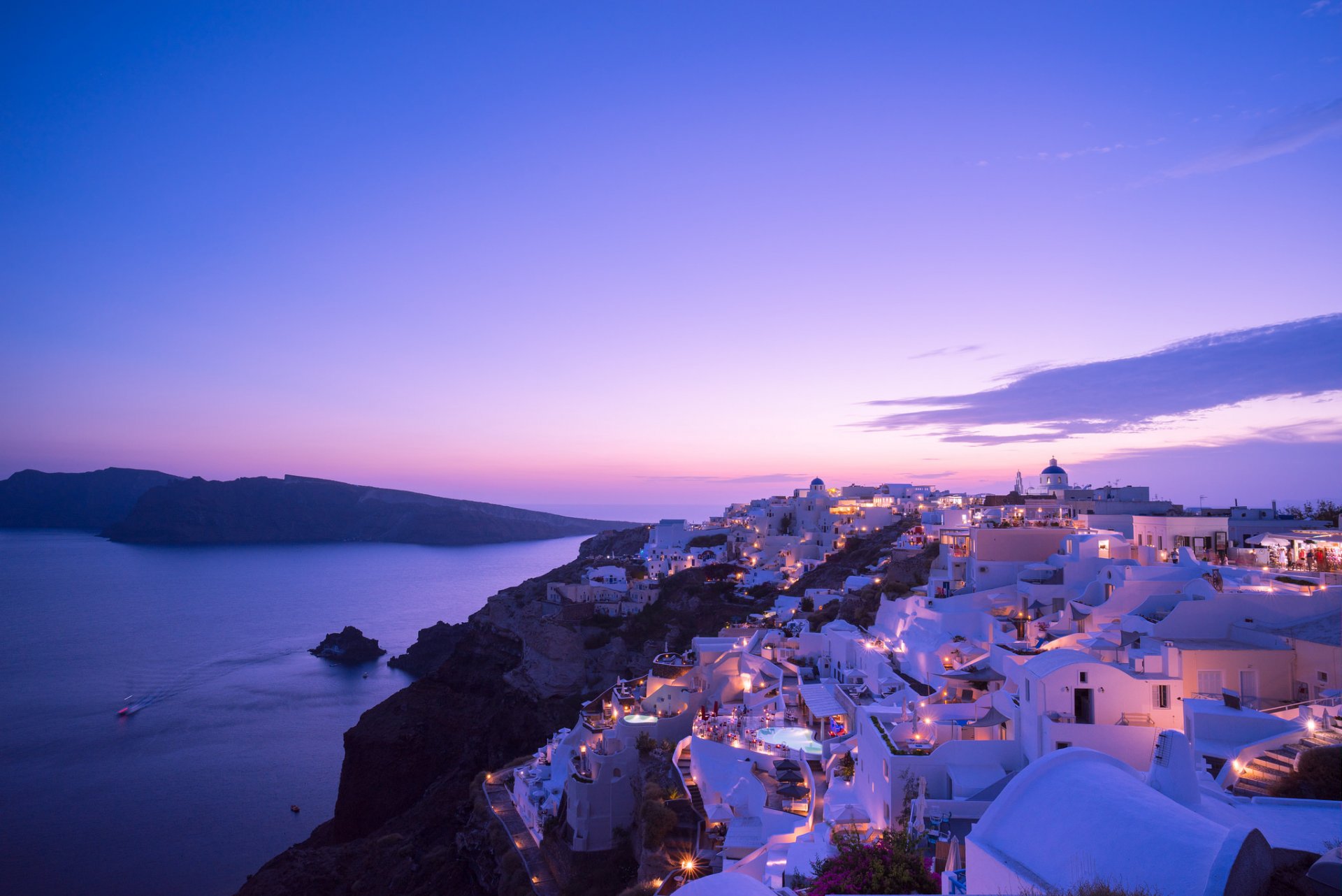 grecia santorini isola di tiro sera case luci mare tramonto