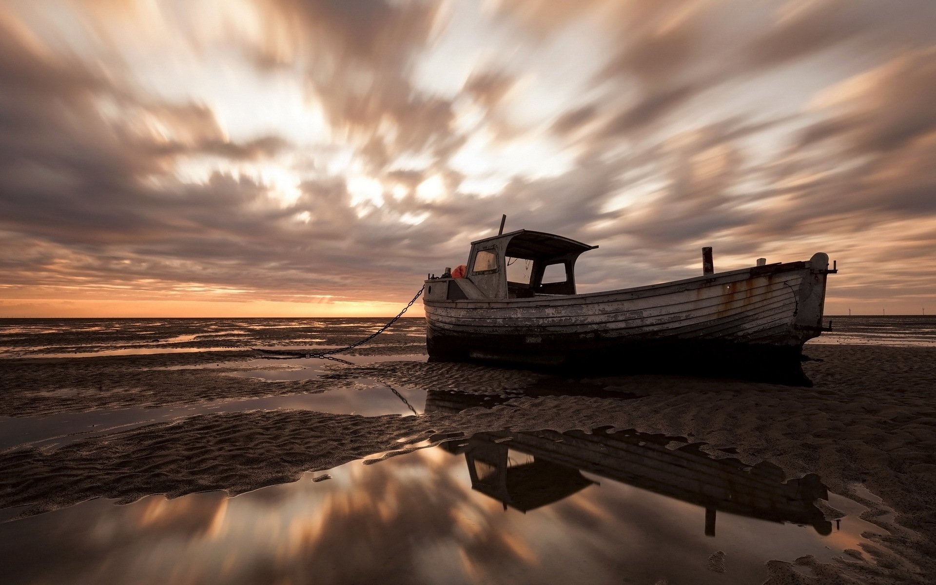 sonnenuntergang meer gestrandet boot landschaft