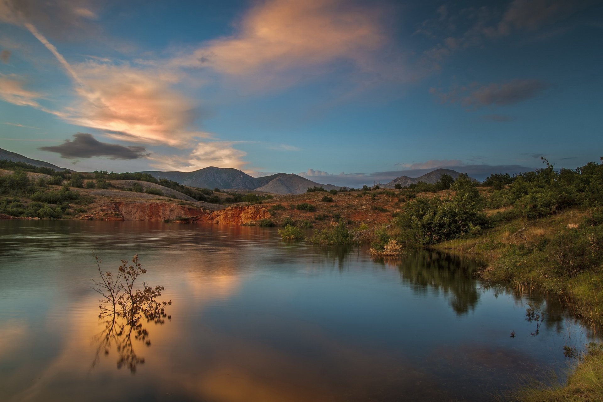 mountain hills lake sunset