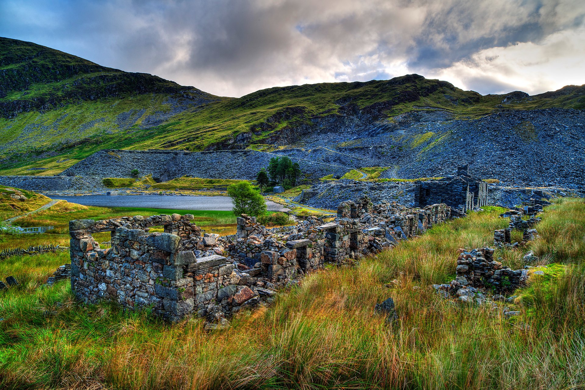 gb snowdonia sky clouds clouds mountains rocks ruins ruins lake grass tree