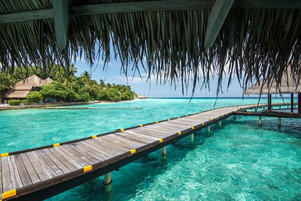 Long pier over blue water