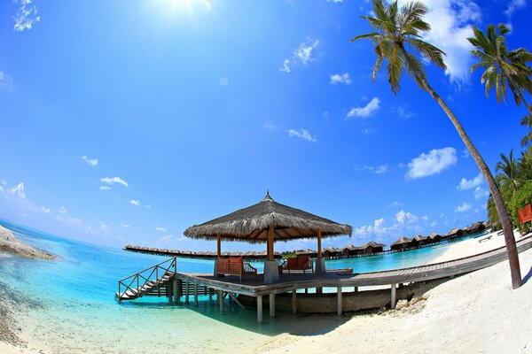 Gazebo for relaxation with a descent into the sea