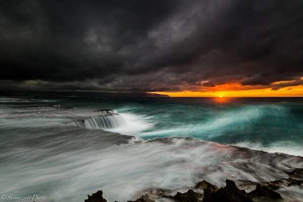 Spectacular image of a thunderstorm and a waterfall