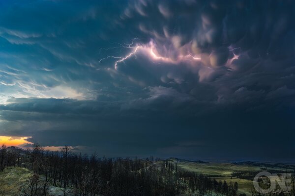 Dark blue sky with lightning