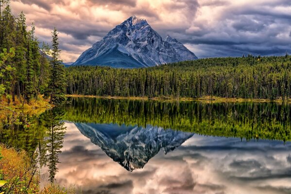 Lonely mountain, against the background of cloudy weather