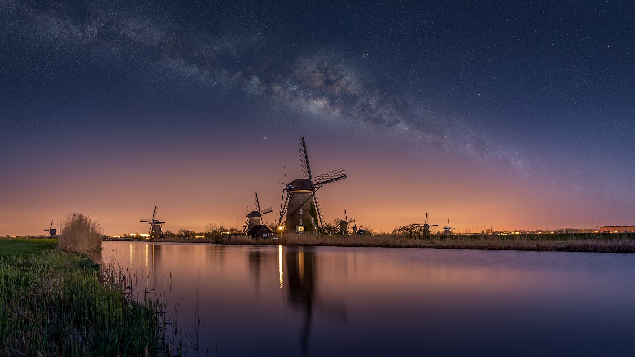 paesi bassi notte cielo stelle via lattea mulini a vento canale fiume acqua