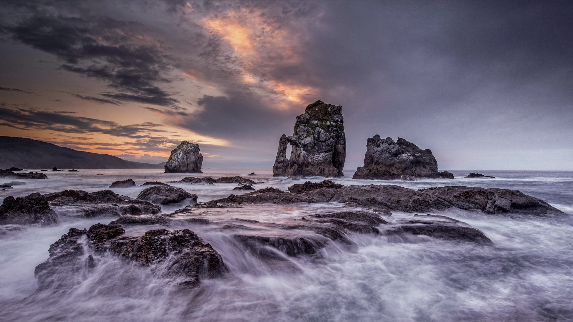 mar rocas paisaje noche