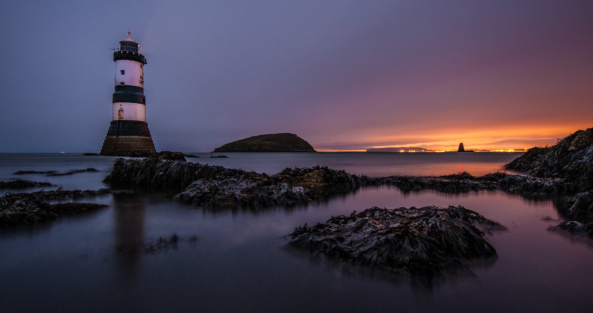 penmon lighthouse black point angelsey beach lighthouse rock sea