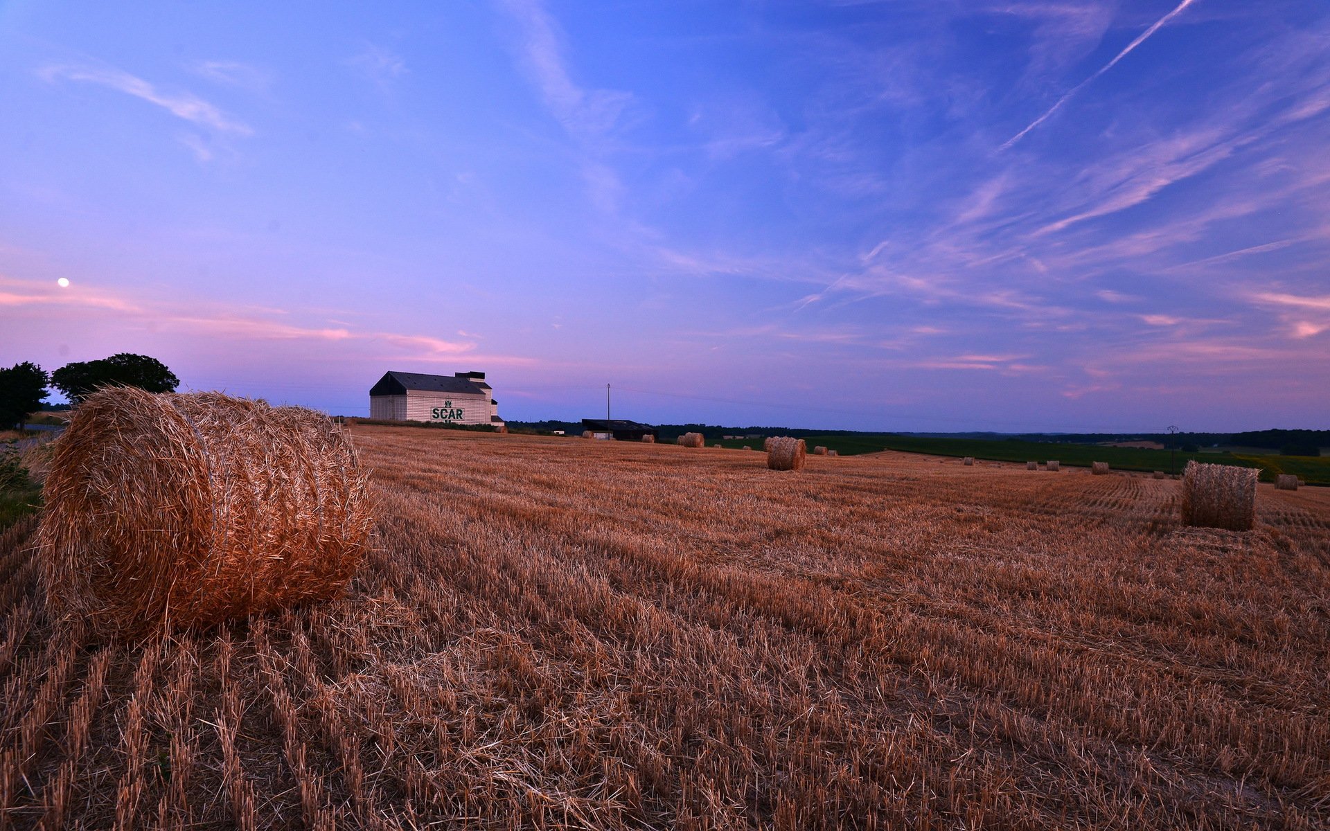 unset the field hay landscape