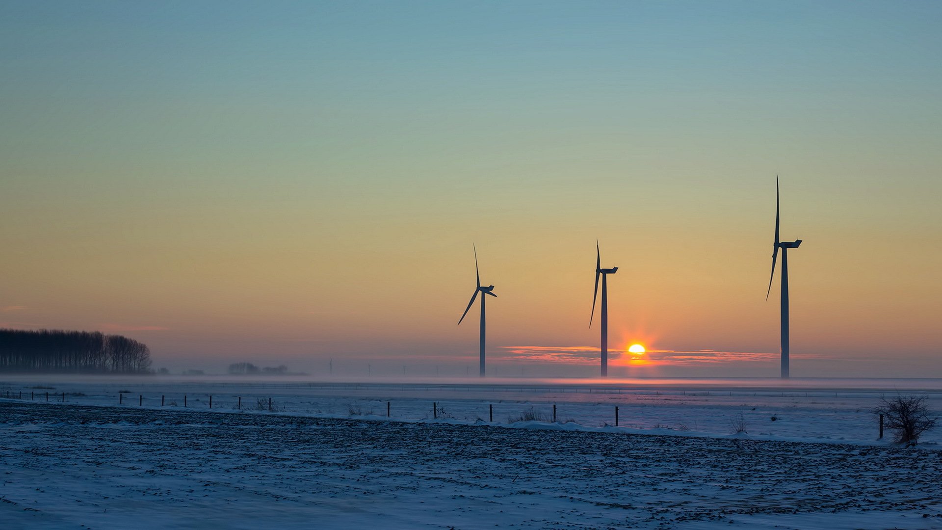 campo puesta de sol molinos de viento