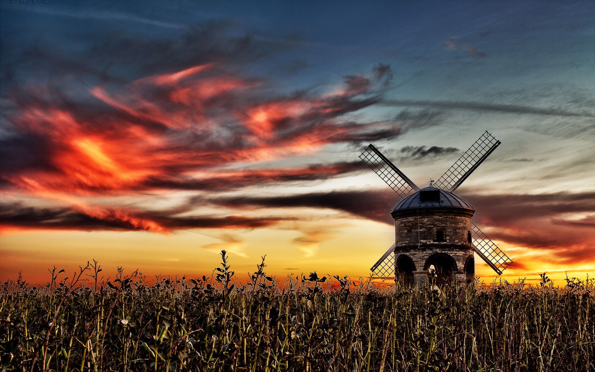 puesta de sol campo molino