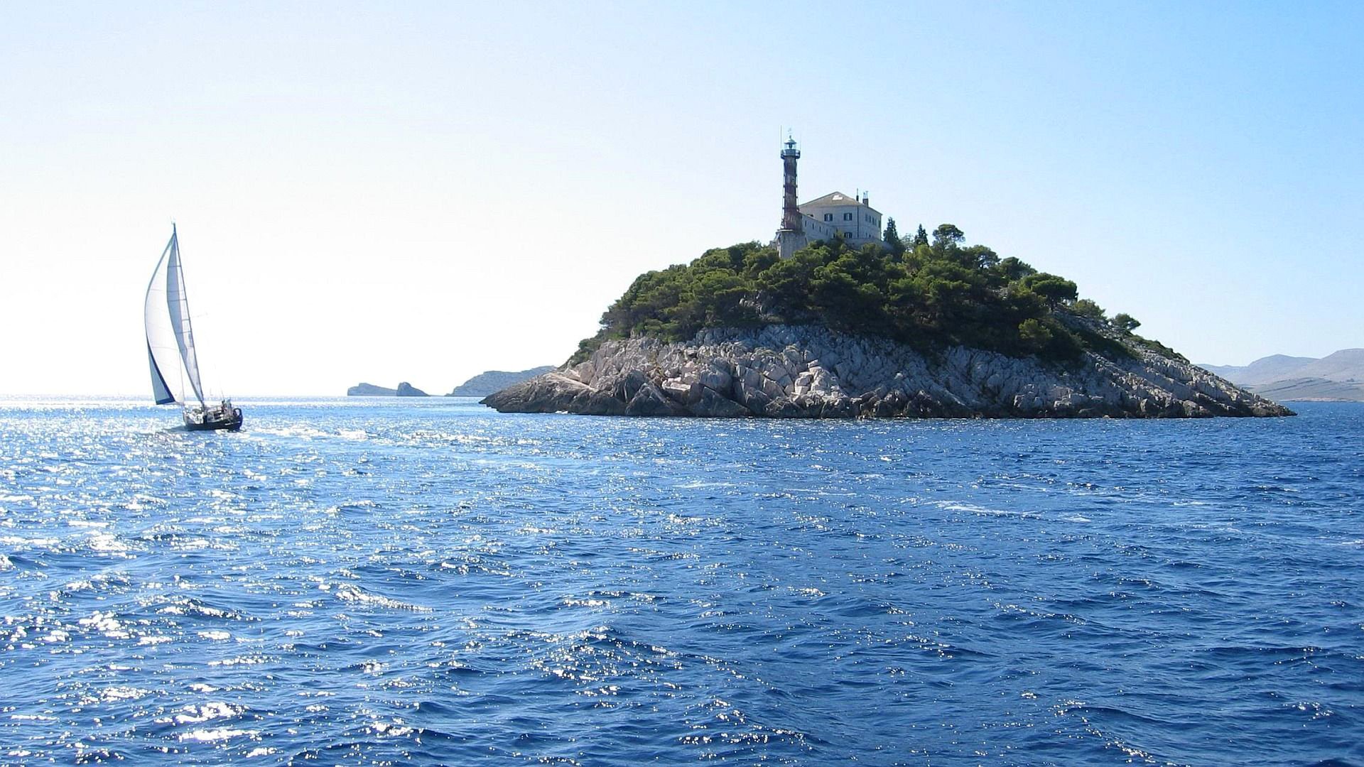 himmel meer insel rock leuchtturm boot segel