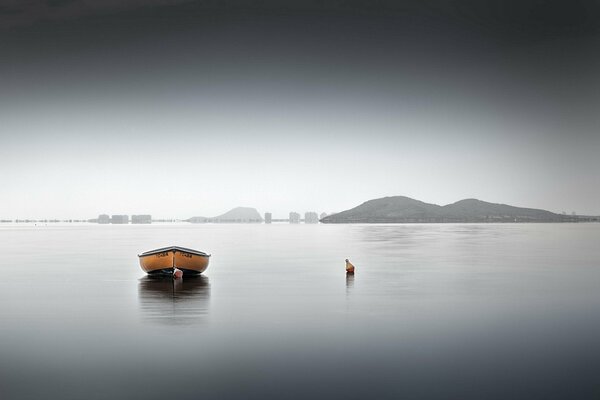 A lonely boat at sea among the islands