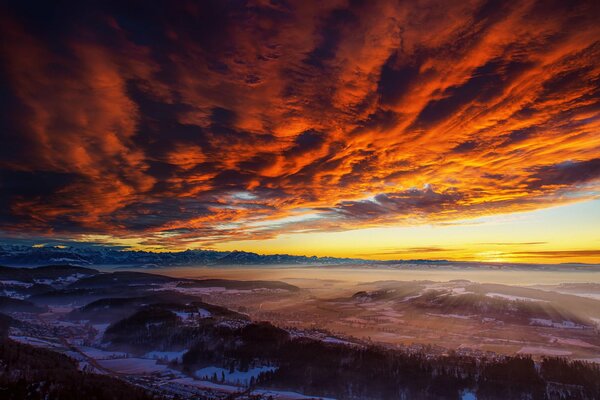 The sky drowning in a mountain valley