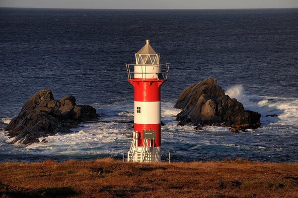 Newfoundland and Labrador, Canada, Atlantic Ocean in Canada, lighthouse on the coast, rocks