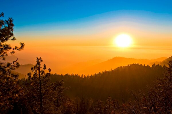 Sunset on the background of beautiful mountains