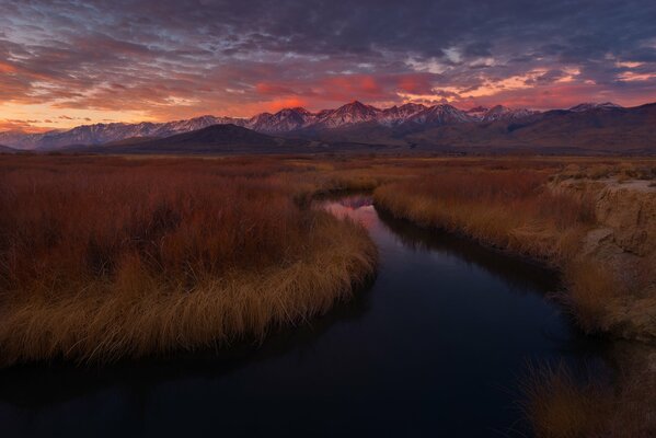 Evening mountain valley by the river