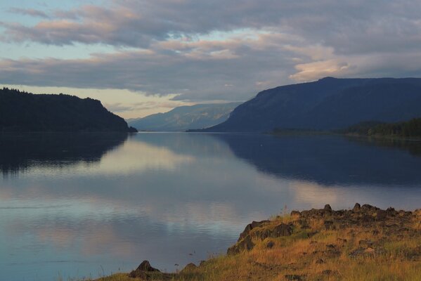 Landscape lake in the mountains in the evening