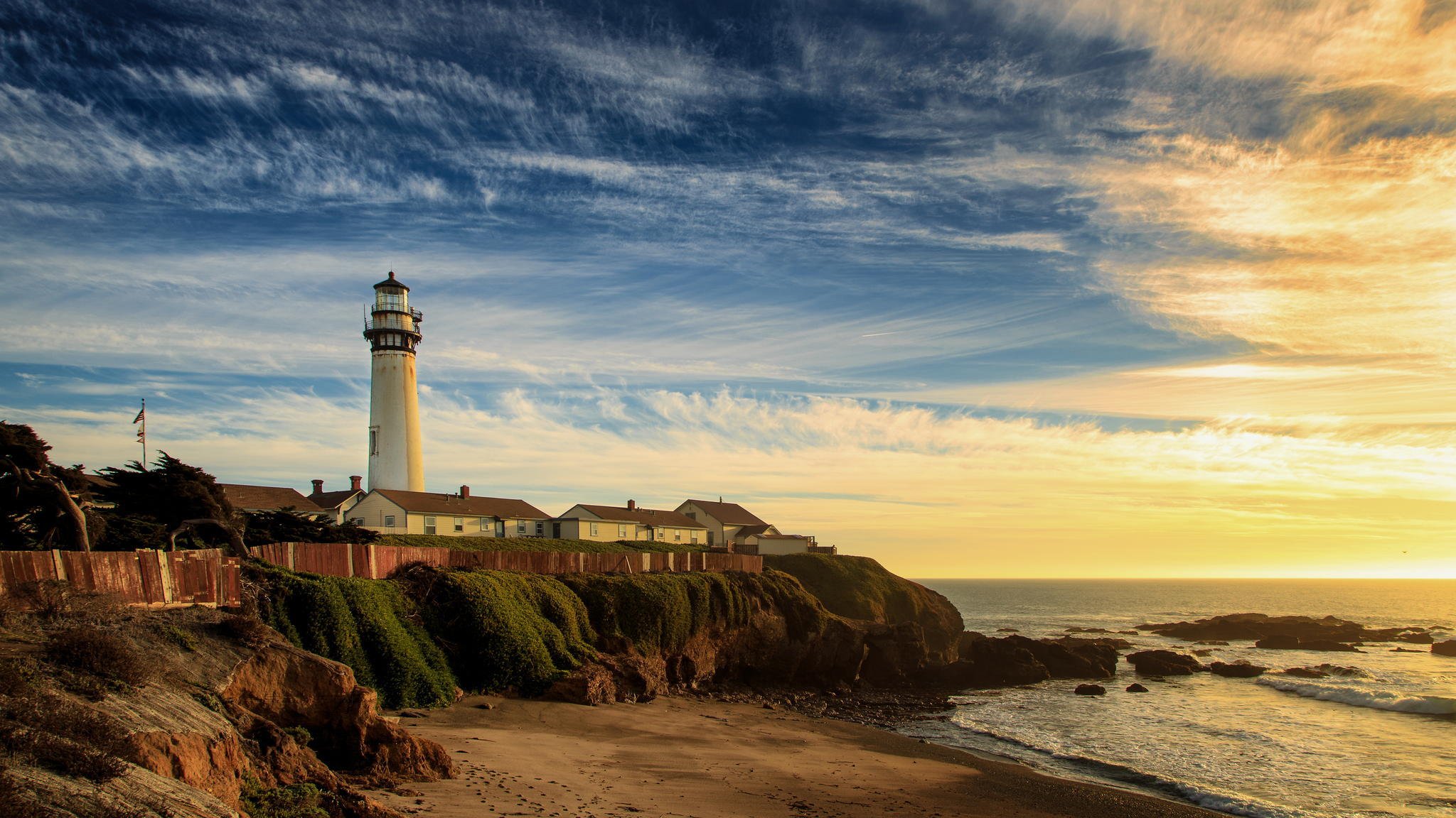 lighthouse shore beach sea