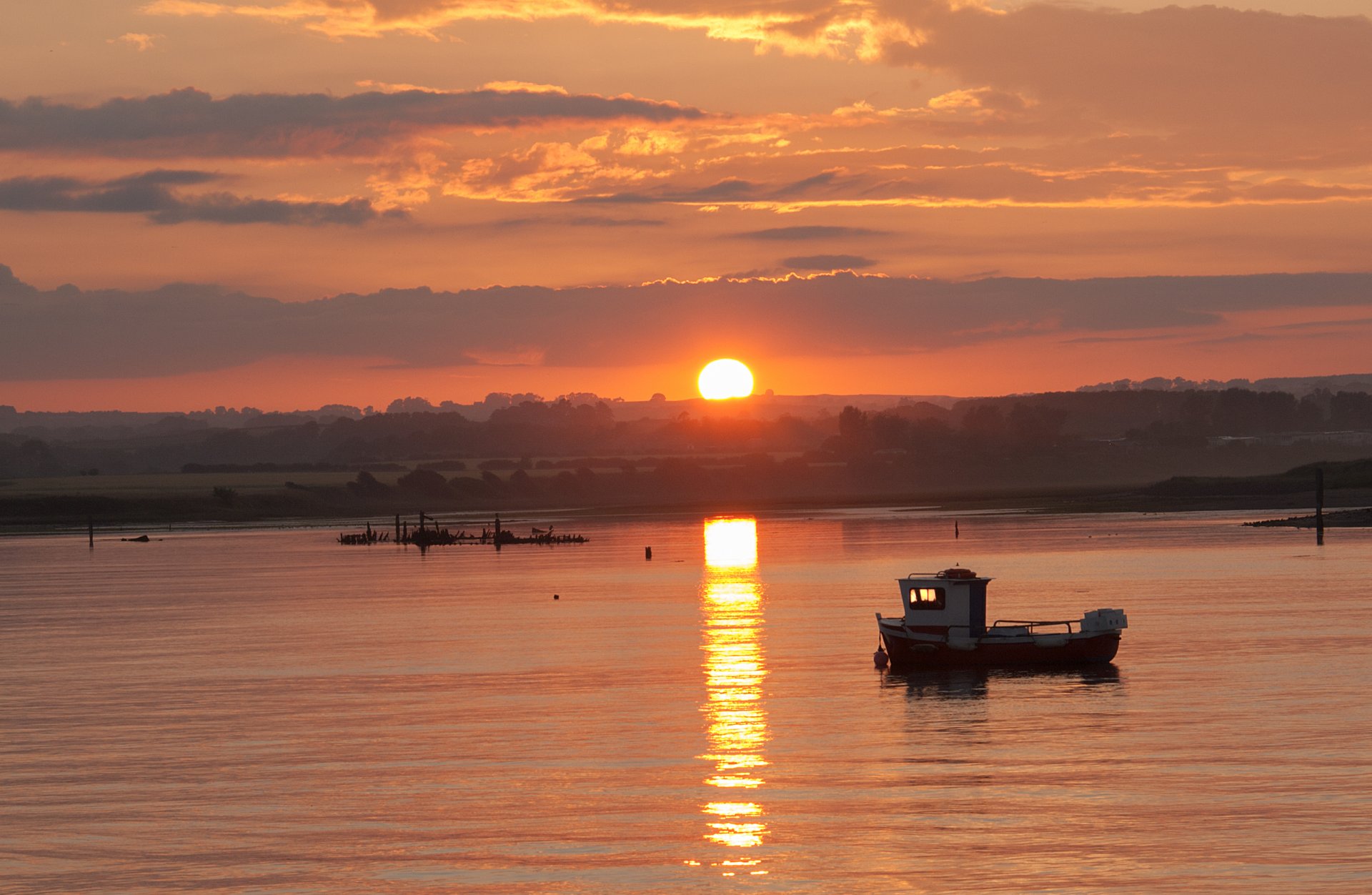 lac bateau coucher de soleil