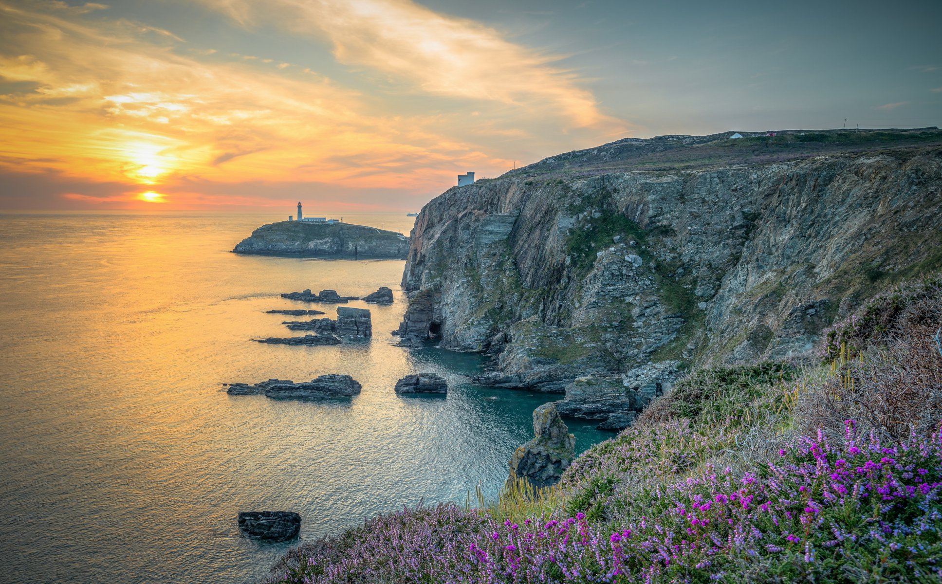 england north wales rock. sunset lighthouse