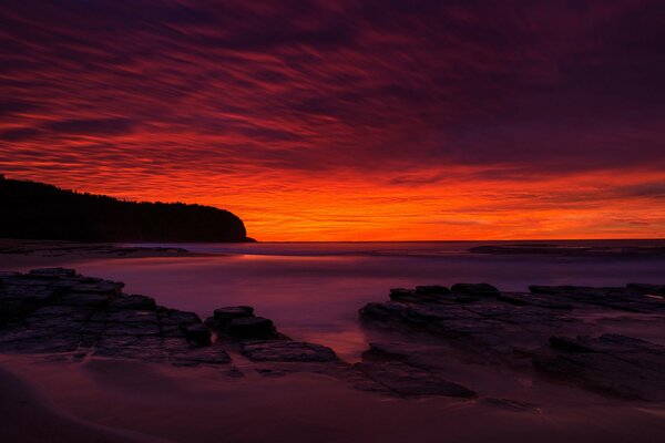 Seascape, scarlet sunset