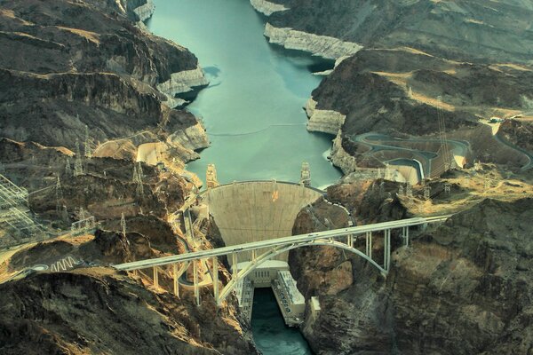 Bridge dam river rocks