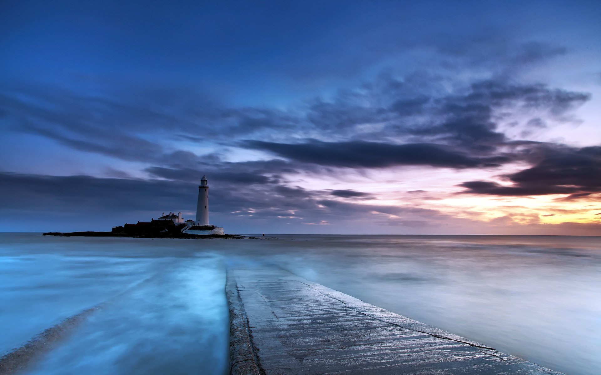 puesta de sol mar faro