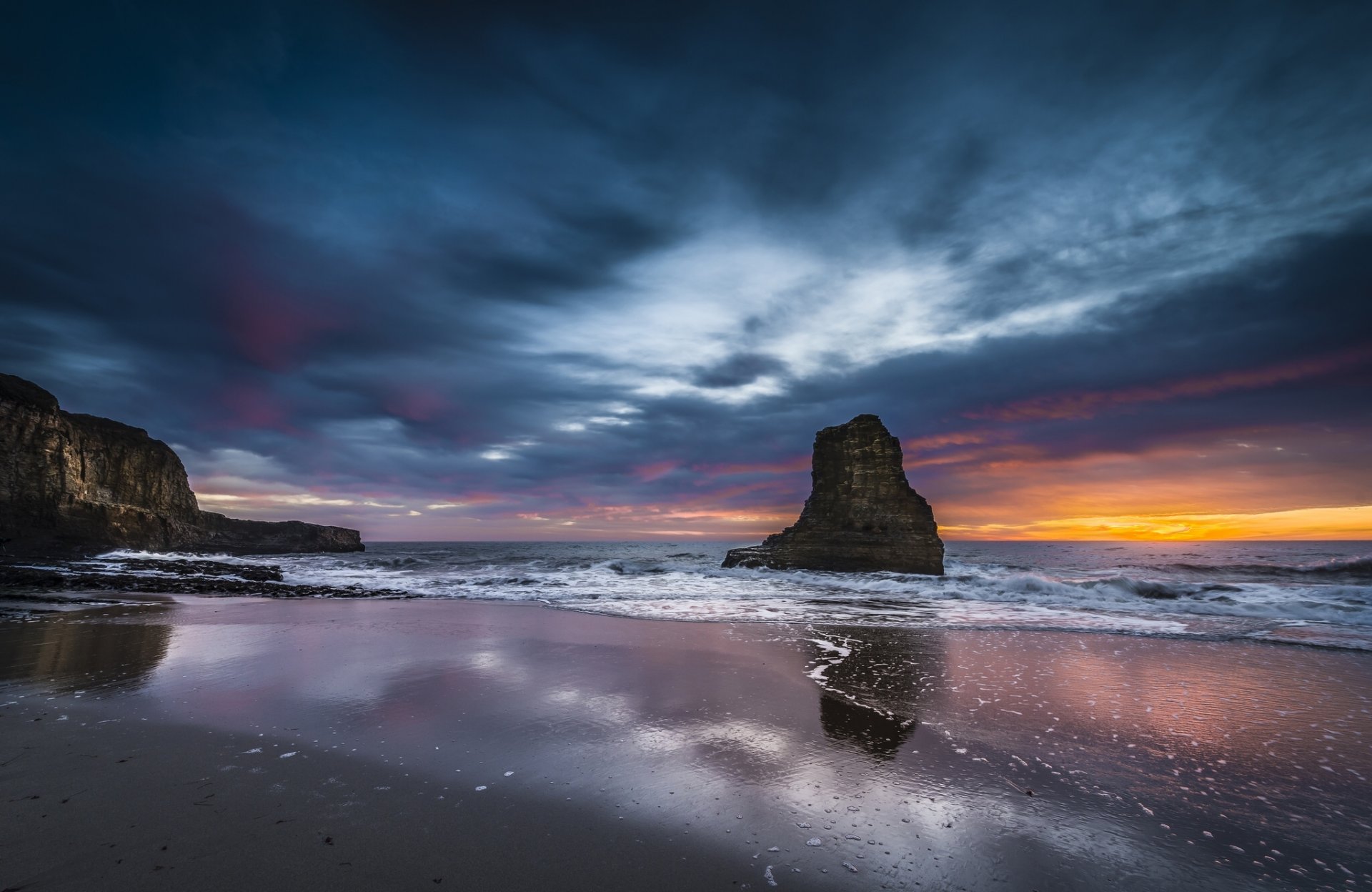 océano puesta de sol rocas nubes