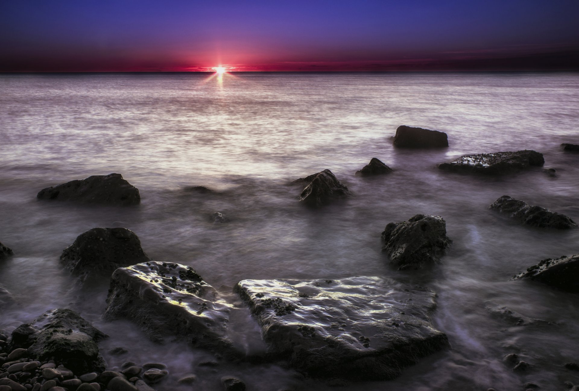 ocean shore rocks morning dawn dawn sky sun sunrise