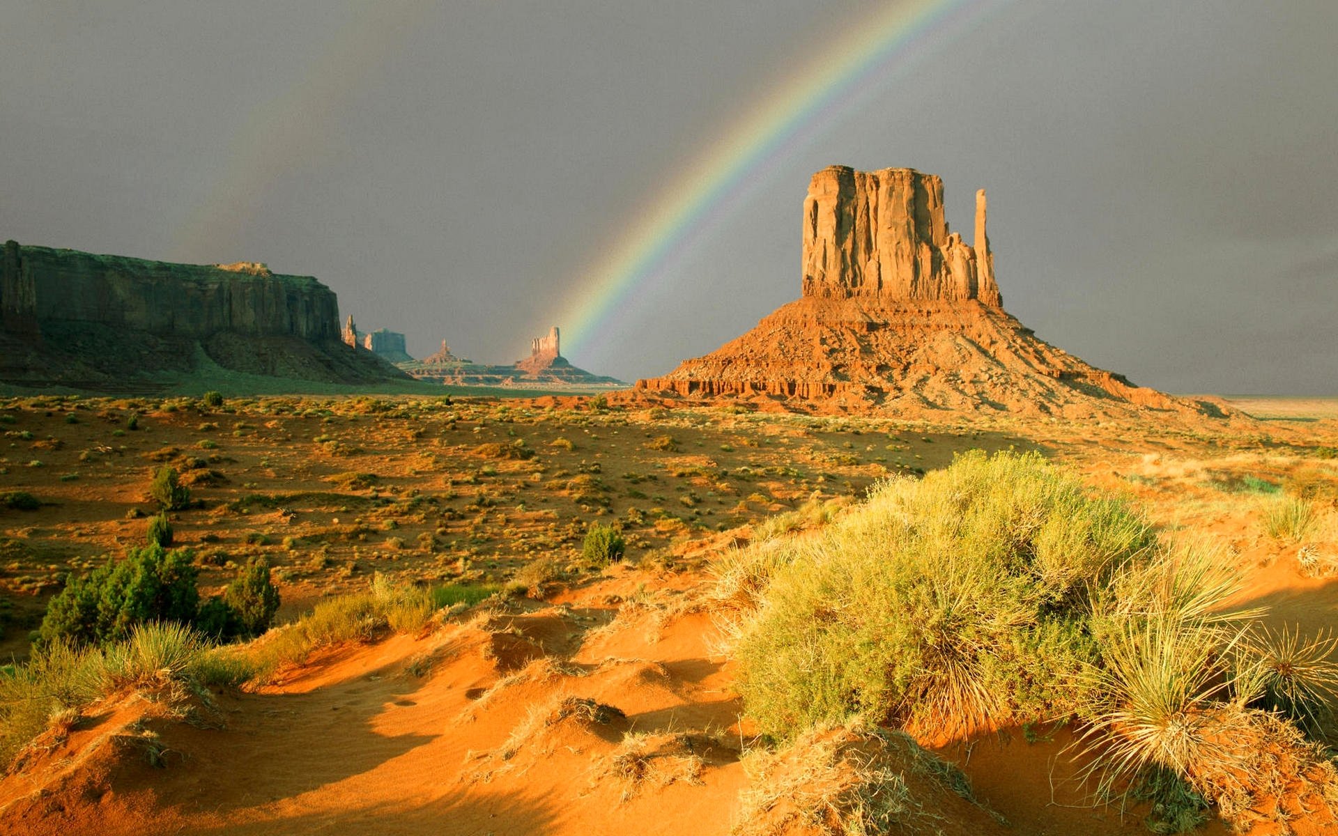 canyon rock desert sky rainbow