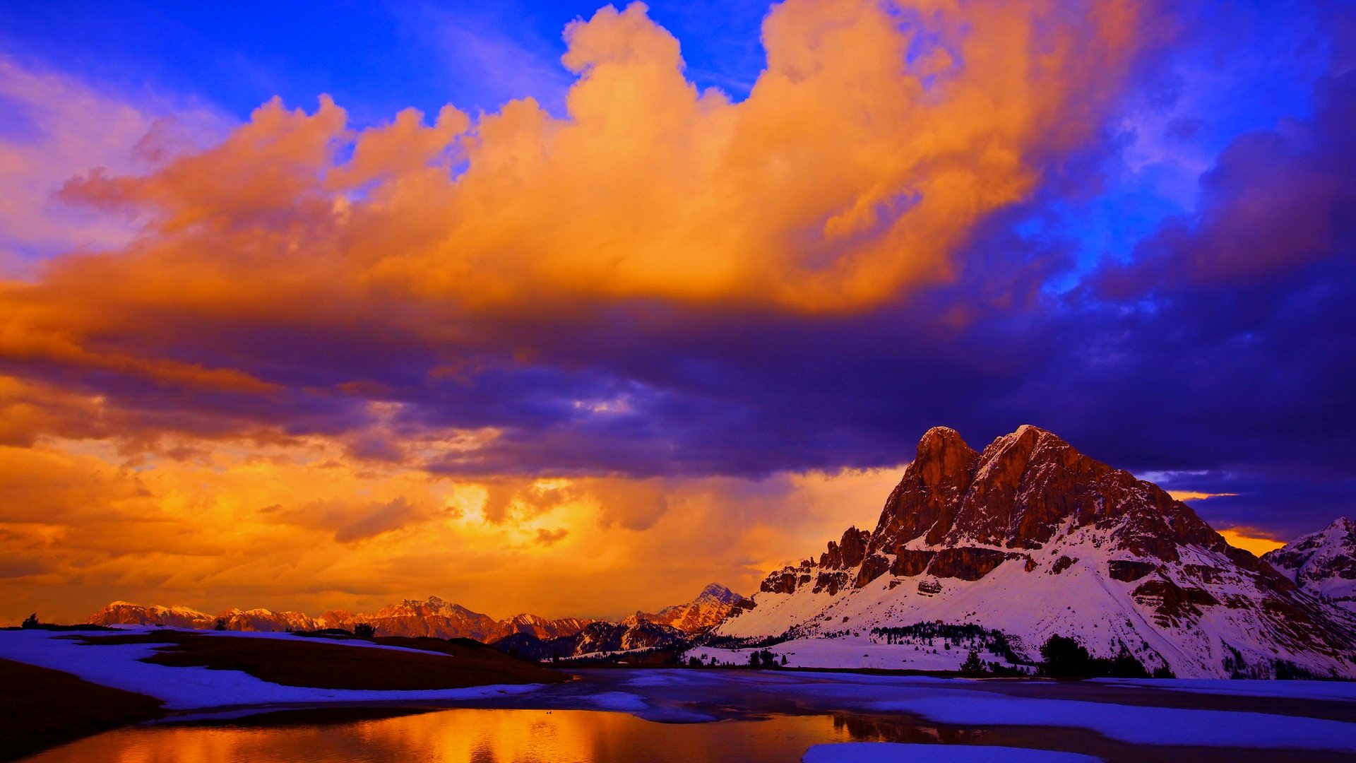 ciel nuages coucher de soleil montagnes neige lac