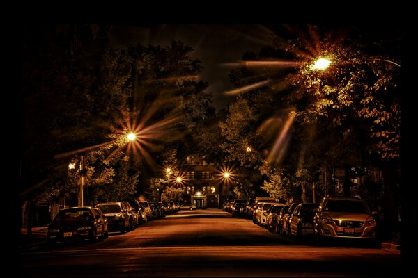 Night street lit by lanterns