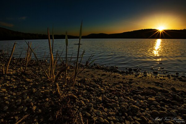 Beautiful sunset in the reflection of the lake