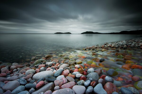 Gloomy sky and bright shore