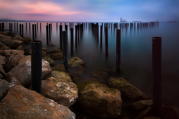 Oil rigs in the sea near the shore