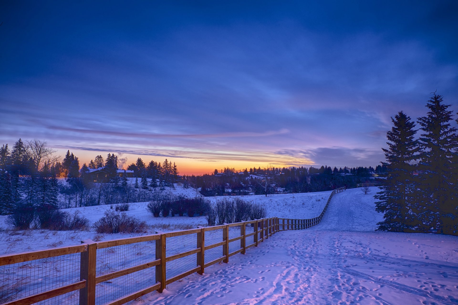 winter morning sunrise village village fence path snow footprint