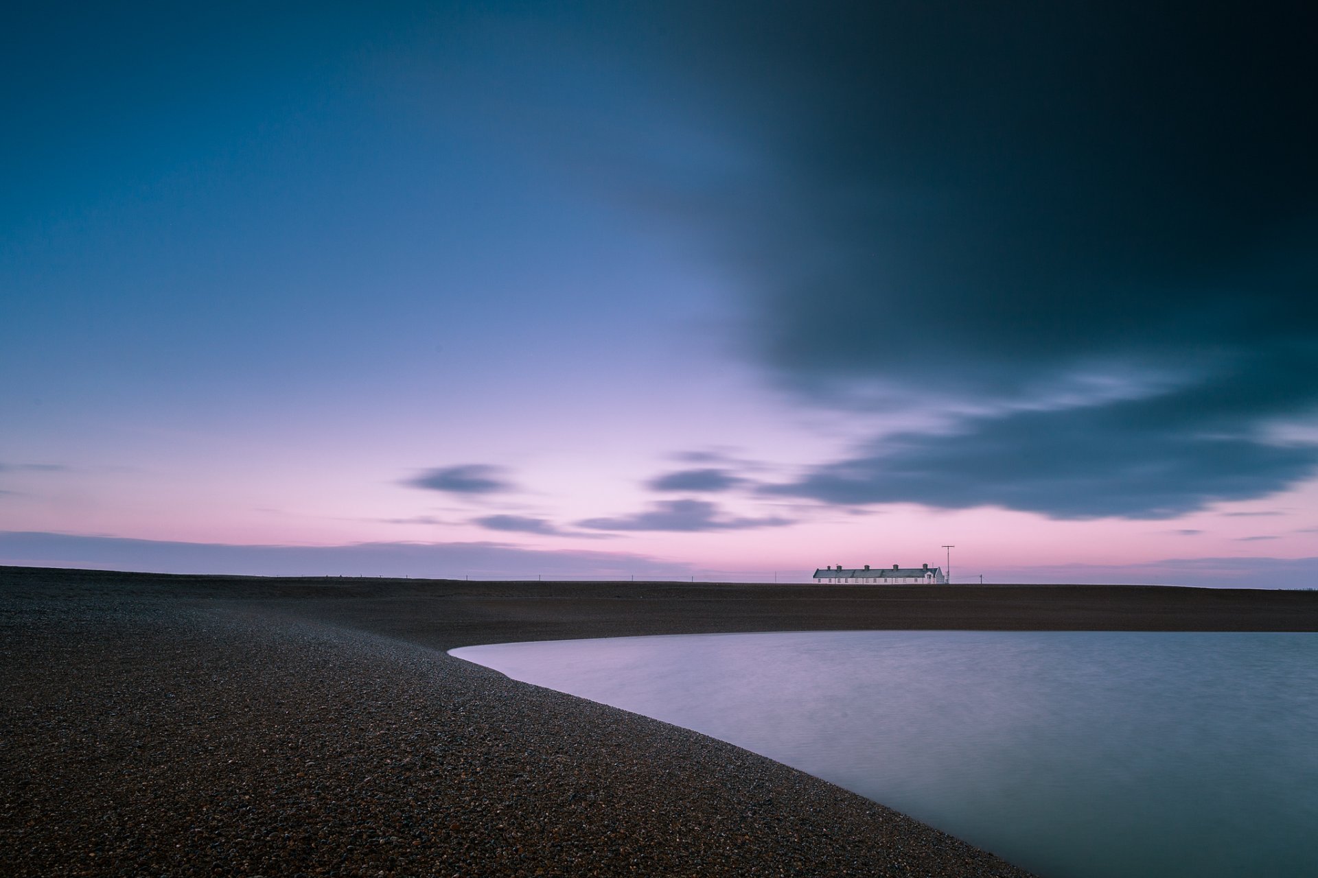 great britain england coast bay houses far away evening pink sunset sky clouds cloud