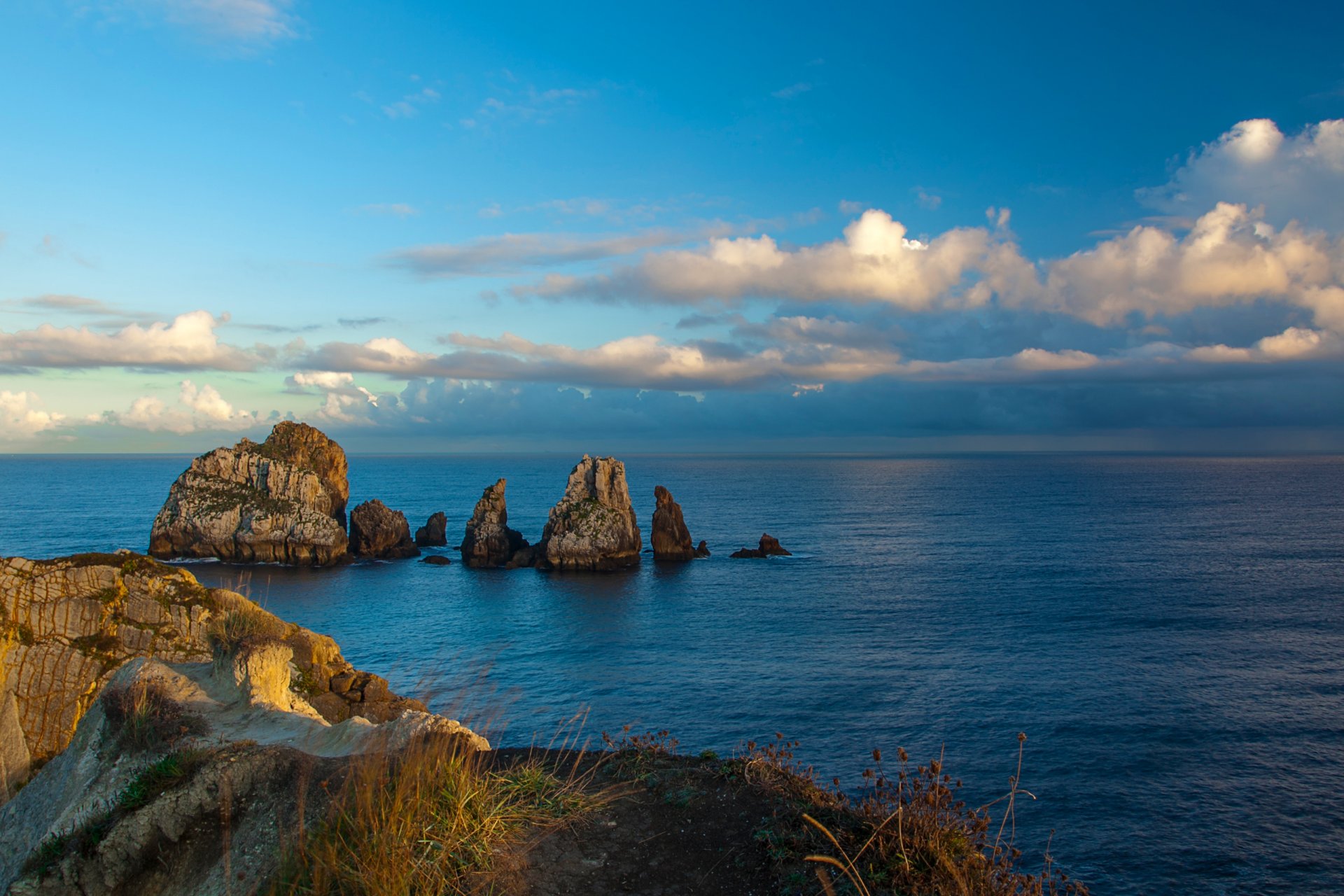 cielo nubes mar piedras roca